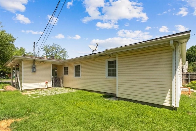 5841 Tracyne Dr, Westworth Village, TX 76114 - rear view of property with a yard