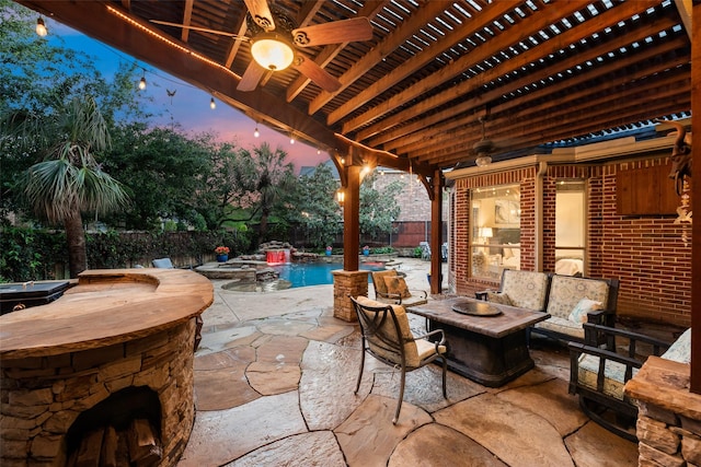 view of patio with a fenced in pool, a fire pit, ceiling fan, and a fenced backyard