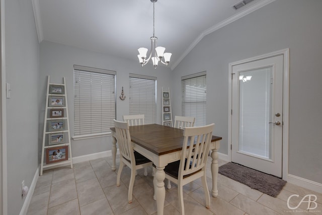 dining space featuring lofted ceiling, light tile patterned floors, a chandelier, and baseboards