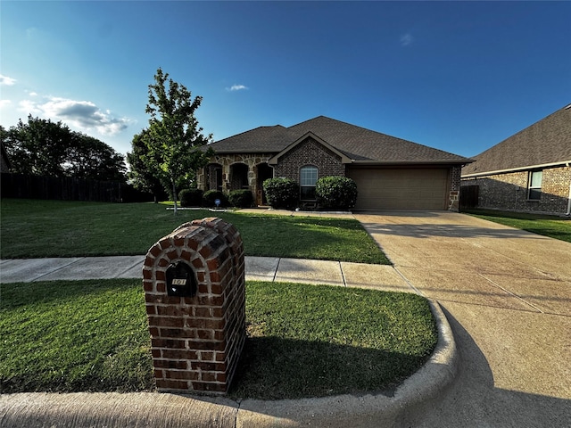 101 Holly St, Waxahachie, TX 75165 - view of front facade with an attached garage, concrete driveway, and brick siding