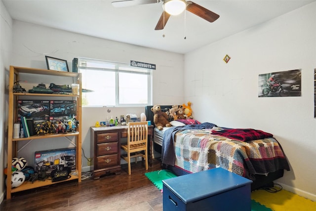 bedroom featuring wood finished floors and a ceiling fan