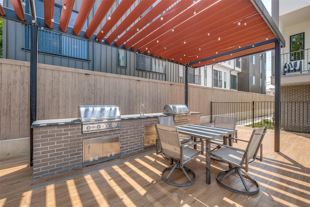 4517 Munger Ave Unit 106, Dallas, TX 75204 - view of patio with outdoor dining area and a sink