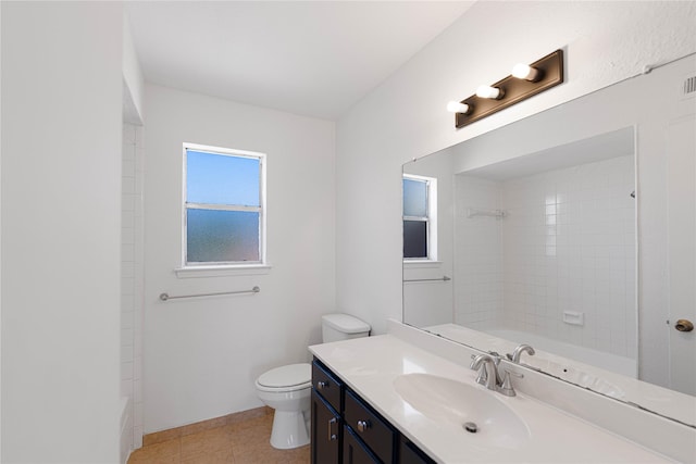 full bath featuring visible vents, tub / shower combination, toilet, vanity, and tile patterned flooring