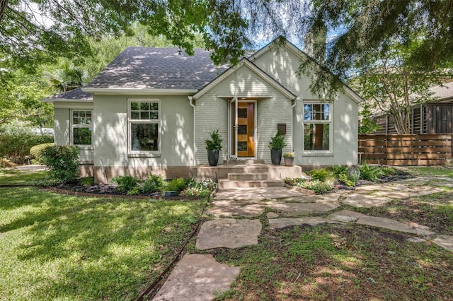 1580 Stemmons Ave, Dallas, TX 75208 - view of front of home with brick siding and roof with shingles