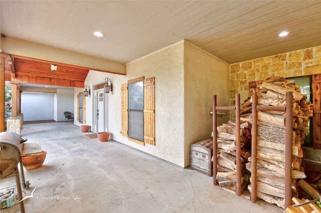 interior space with recessed lighting, concrete flooring, and wood ceiling