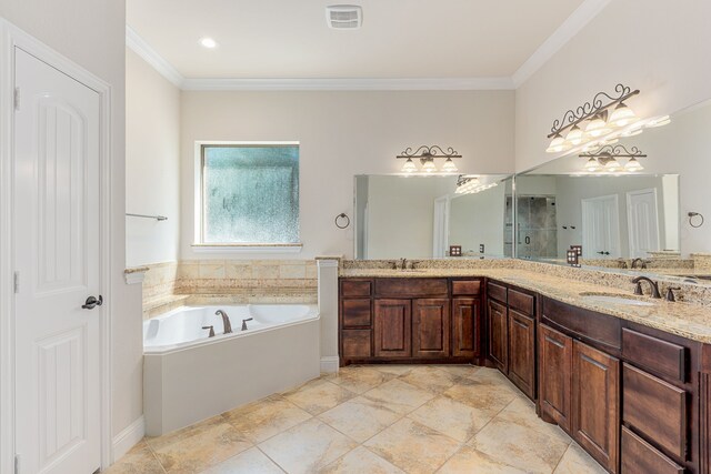 141 Claremont Dr, Ovilla, TX 75154 - full bathroom featuring ornamental molding, a garden tub, a shower stall, and double vanity