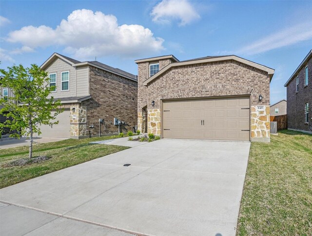 849 Breakwater Dr, Princeton, TX 75407 - view of front of house featuring concrete driveway, stone siding, a front yard, central AC unit, and brick siding