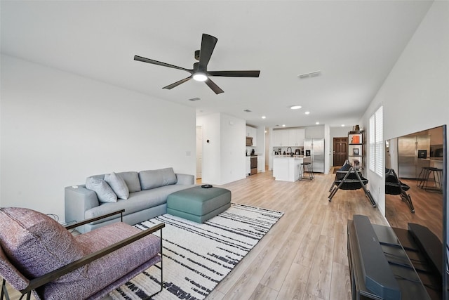 849 Breakwater Dr, Princeton, TX 75407 - living room with recessed lighting, a ceiling fan, visible vents, and light wood-style floors