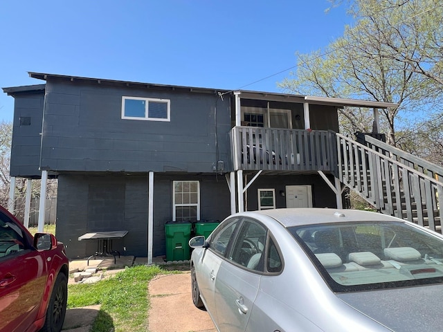 view of front of house with stairway