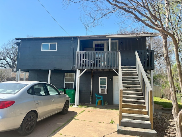 view of front of house with stairs