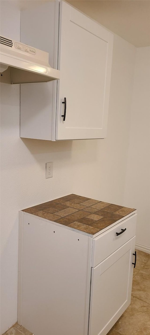 interior details with under cabinet range hood