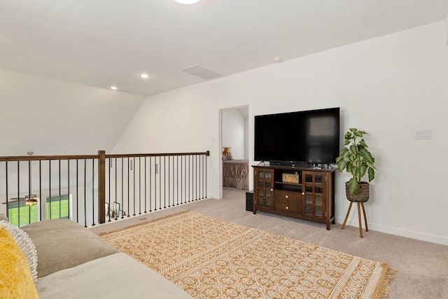 living area with lofted ceiling, visible vents, baseboards, recessed lighting, and carpet