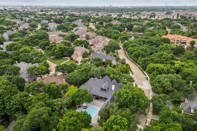 birds eye view of property with a residential view