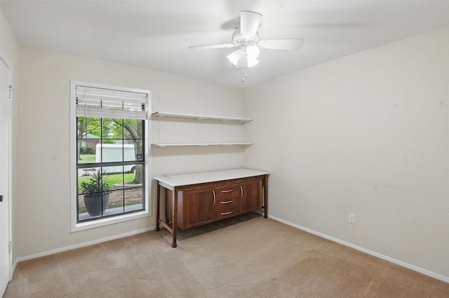 1018 Meridith Dr, Terrell, TX 75160 - unfurnished room with light colored carpet, baseboards, and a ceiling fan