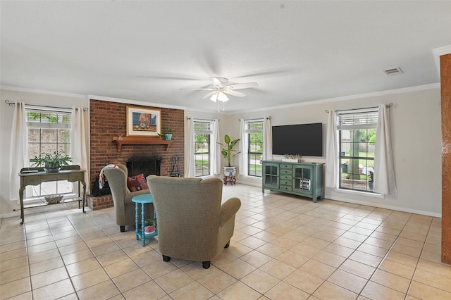 living room featuring light tile patterned floors, ornamental molding, ceiling fan, and a wealth of natural light