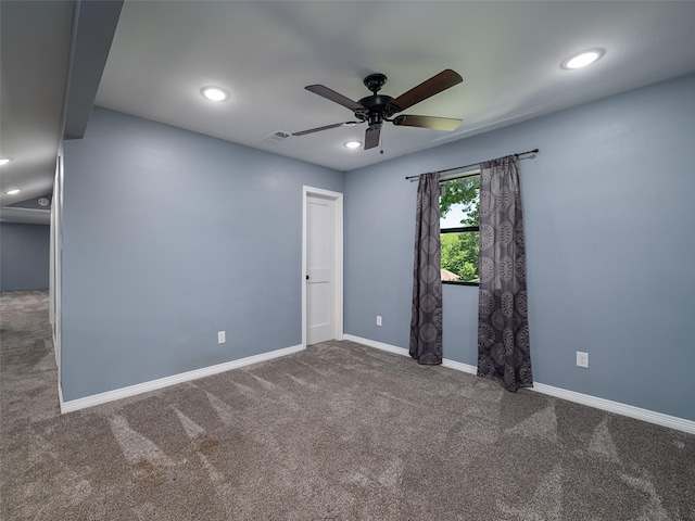 carpeted empty room with baseboards, recessed lighting, visible vents, and a ceiling fan