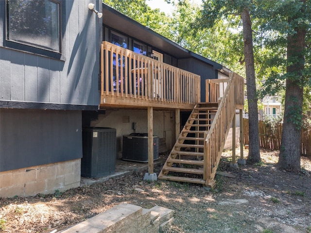 back of house with fence, a deck, central AC, and stairs