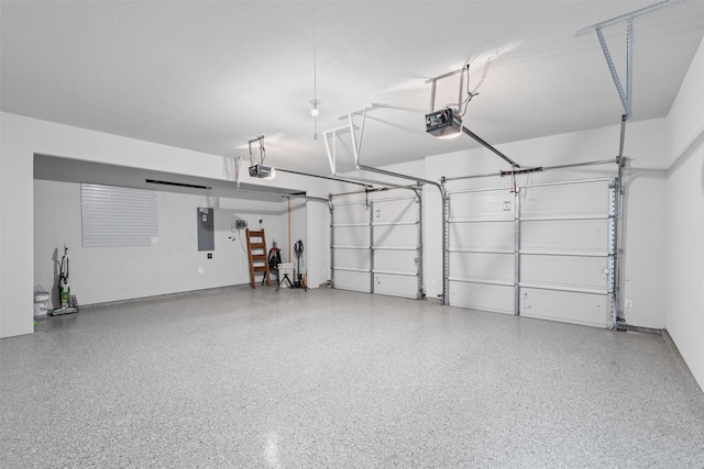 garage featuring a garage door opener and electric panel