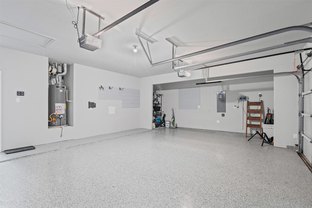 7416 San Jacinto Trl, Mckinney, TX 75071 - garage with water heater, a garage door opener, and electric panel
