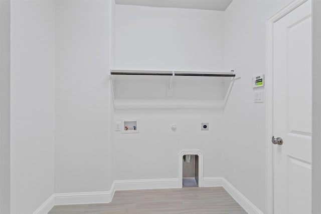 7416 San Jacinto Trl, Mckinney, TX 75071 - laundry room with hookup for a gas dryer, hookup for a washing machine, electric dryer hookup, and baseboards