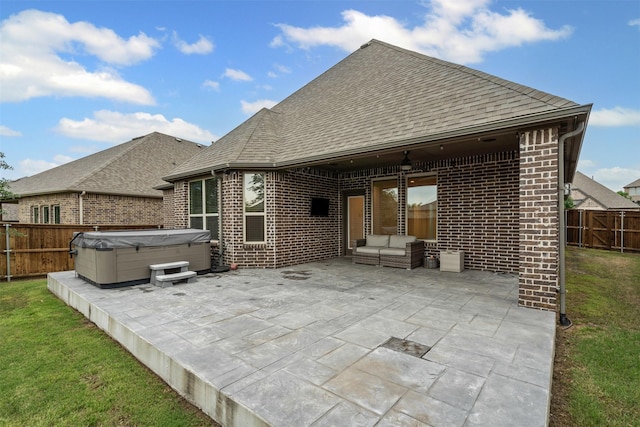 7416 San Jacinto Trl, Mckinney, TX 75071 - rear view of property with a hot tub, a patio area, brick siding, a shingled roof, and outdoor lounge area