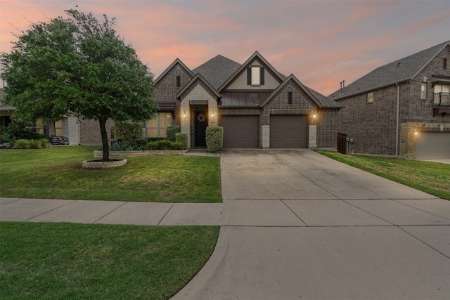 7416 San Jacinto Trl, Mckinney, TX 75071 - view of front of property with driveway, a yard, brick siding, and a garage