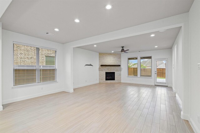 kitchen featuring tasteful backsplash, stainless steel appliances, under cabinet range hood, a sink, and visible vents