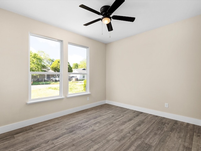 5525 Vesta Farley Rd, Fort Worth, TX 76119 - unfurnished room featuring a ceiling fan, wood finished floors, and baseboards