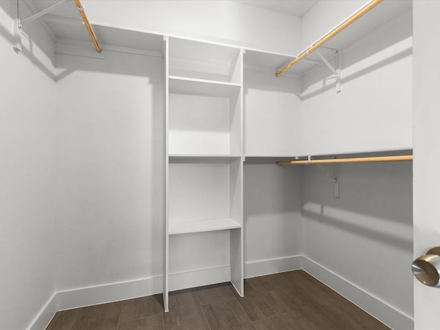 5525 Vesta Farley Rd, Fort Worth, TX 76119 - walk in closet with dark wood finished floors