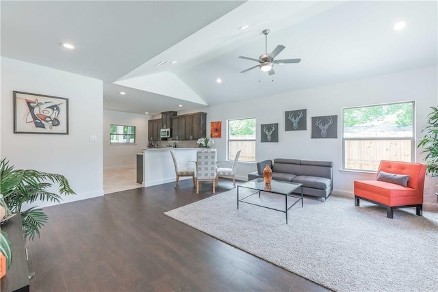 10121 Budtime Ln, Dallas, TX 75217 - living room with recessed lighting, ceiling fan, baseboards, and lofted ceiling