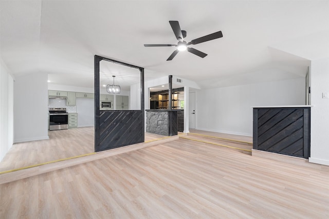 additional living space featuring baseboards, visible vents, ceiling fan, and light wood-style floors