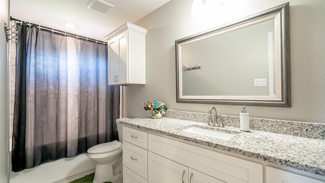 full bath with toilet, visible vents, and vanity