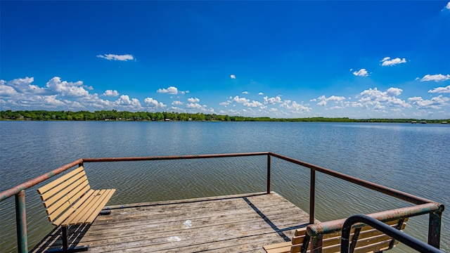 dock area featuring a water view