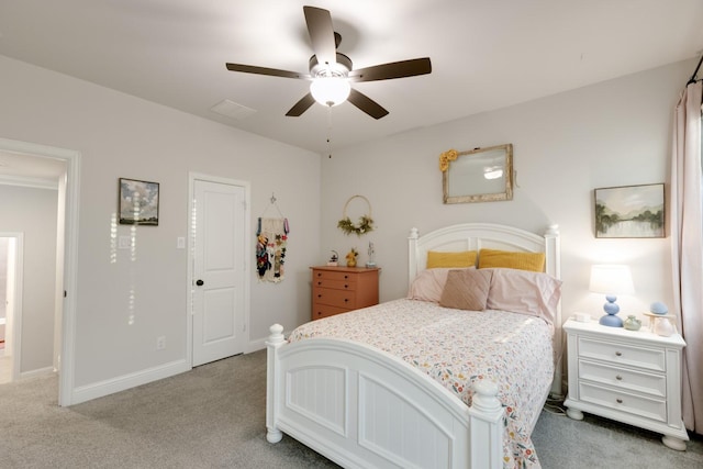 bedroom with baseboards, light carpet, and ceiling fan