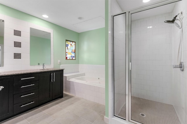 2608 Museum Way Unit 3407, Fort Worth, TX 76107 - bathroom with recessed lighting, tile patterned floors, vanity, a stall shower, and a garden tub