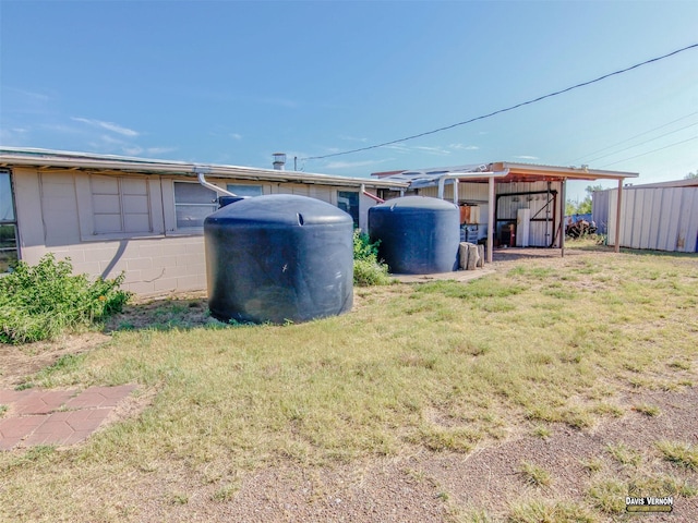 view of yard featuring a carport