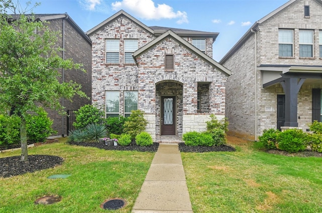 1331 Bailey Ln, Allen, TX 75013 - view of front of home with brick siding and a front lawn
