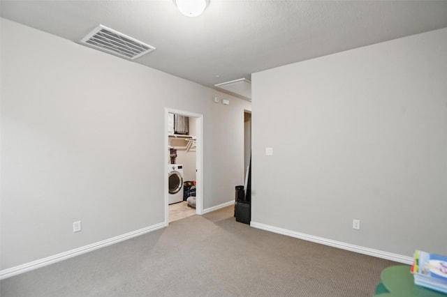 1331 Bailey Ln, Allen, TX 75013 - carpeted empty room with baseboards, visible vents, washer / clothes dryer, and attic access