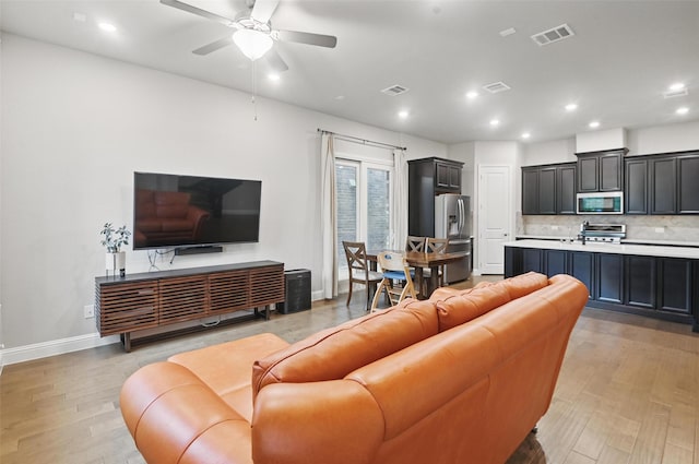 1331 Bailey Ln, Allen, TX 75013 - living room with baseboards, visible vents, ceiling fan, and recessed lighting