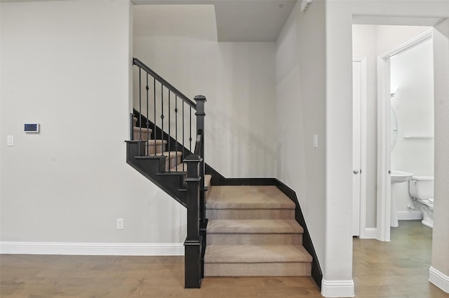 1331 Bailey Ln, Allen, TX 75013 - stairway with wood finished floors and baseboards