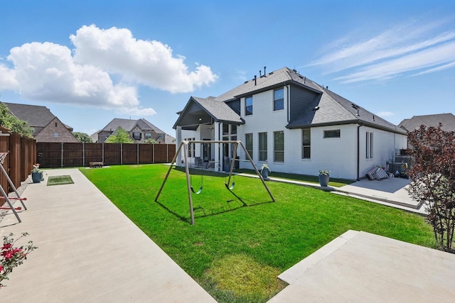 741 Almeda Ln, Prosper, TX 75078 - back of house featuring a playground and a patio area