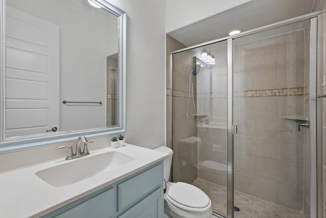 741 Almeda Ln, Prosper, TX 75078 - bathroom featuring a shower stall, toilet, and vanity