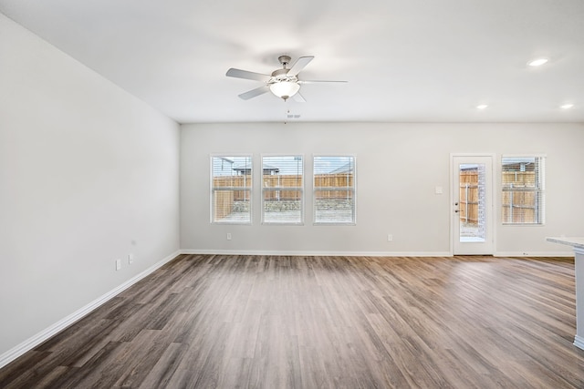 419 Bertney Dr, Princeton, TX 75071 - unfurnished living room with recessed lighting, ceiling fan, wood finished floors, and baseboards