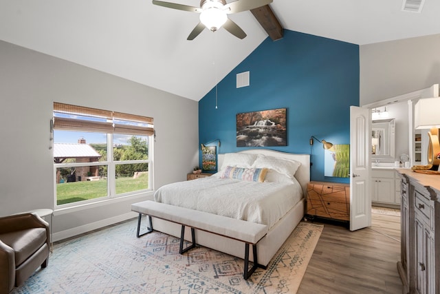 bedroom with beam ceiling, high vaulted ceiling, ceiling fan, visible vents, and light wood-style flooring