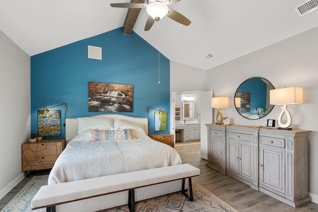 bedroom featuring visible vents, light wood-type flooring, high vaulted ceiling, and beamed ceiling