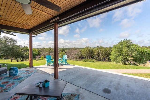 view of patio featuring ceiling fan
