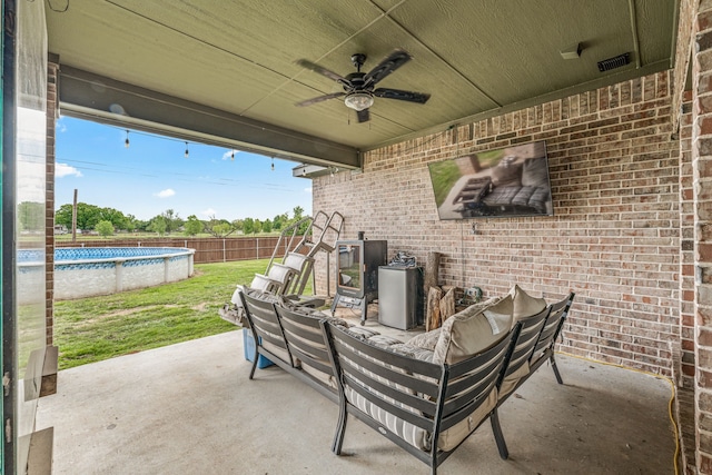 view of patio with a fenced backyard, ceiling fan, visible vents, a fenced in pool, and outdoor lounge area