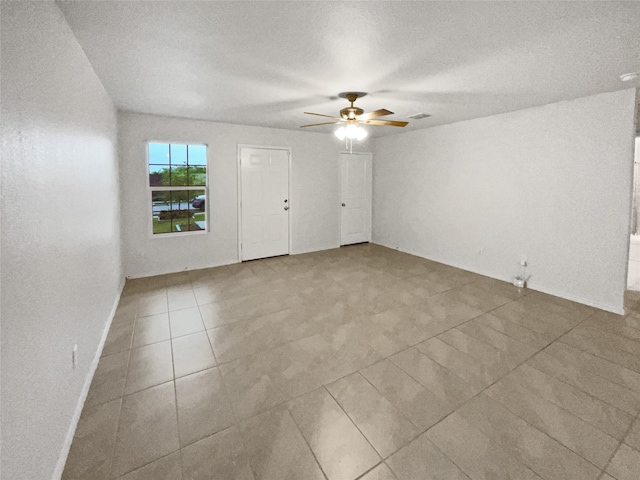 6267 Unbridled Dr, Forney, TX 75126 - foyer with ceiling fan and tile patterned floors
