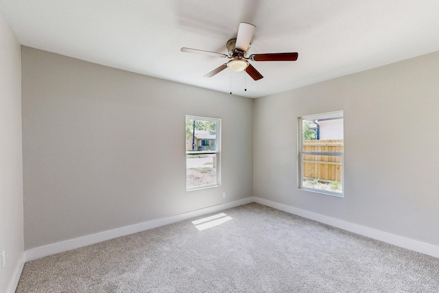 1500 W Collin, Corsicana, TX 75110 - spare room with carpet flooring, ceiling fan, and baseboards