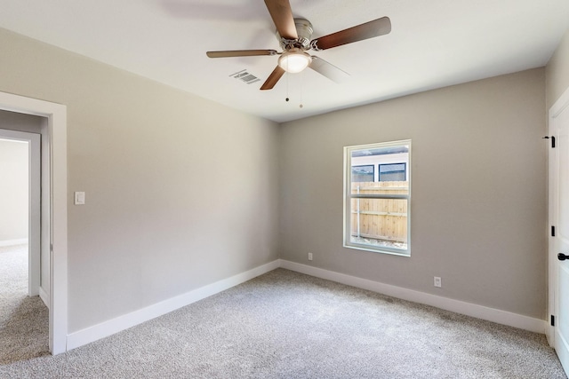 1500 W Collin, Corsicana, TX 75110 - spare room with light colored carpet, a ceiling fan, and baseboards